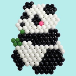 Panda che mangia bambù